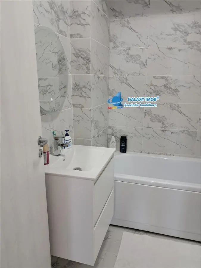 INCHIRIERE APARTAMENT 3 CAMEREL modern cu garaj - foto 16
