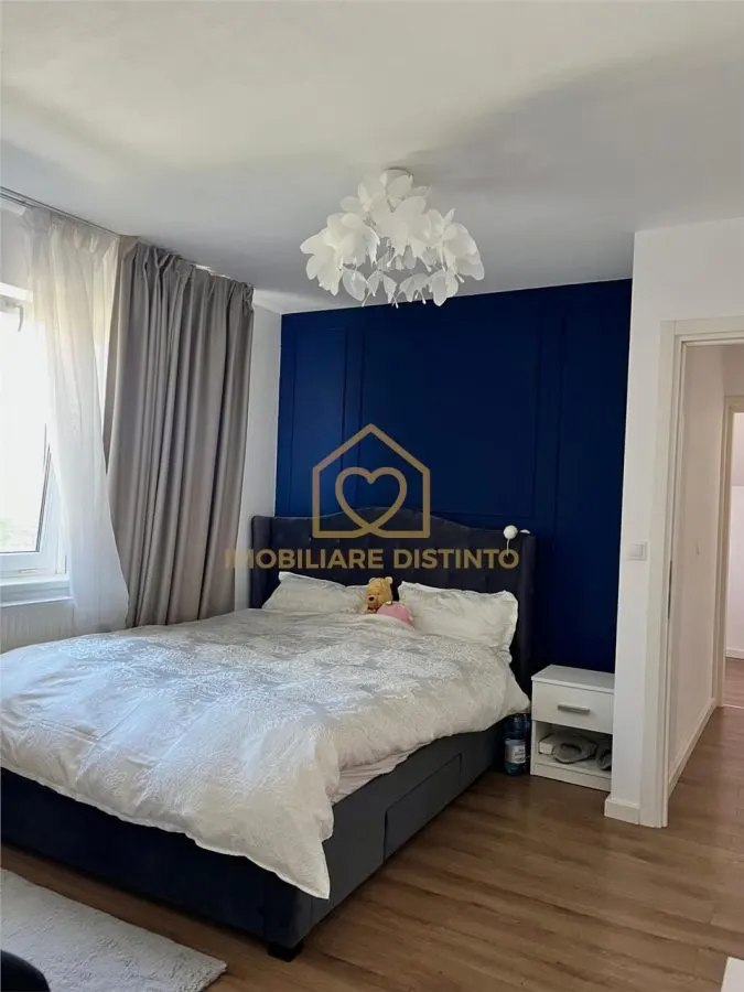 Casa cu 4 camere si garaj - foto 2