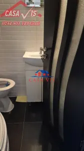 VANDUTA !!! Garsoniera in Onesti, zona Kaufland, etaj 2. - foto 7