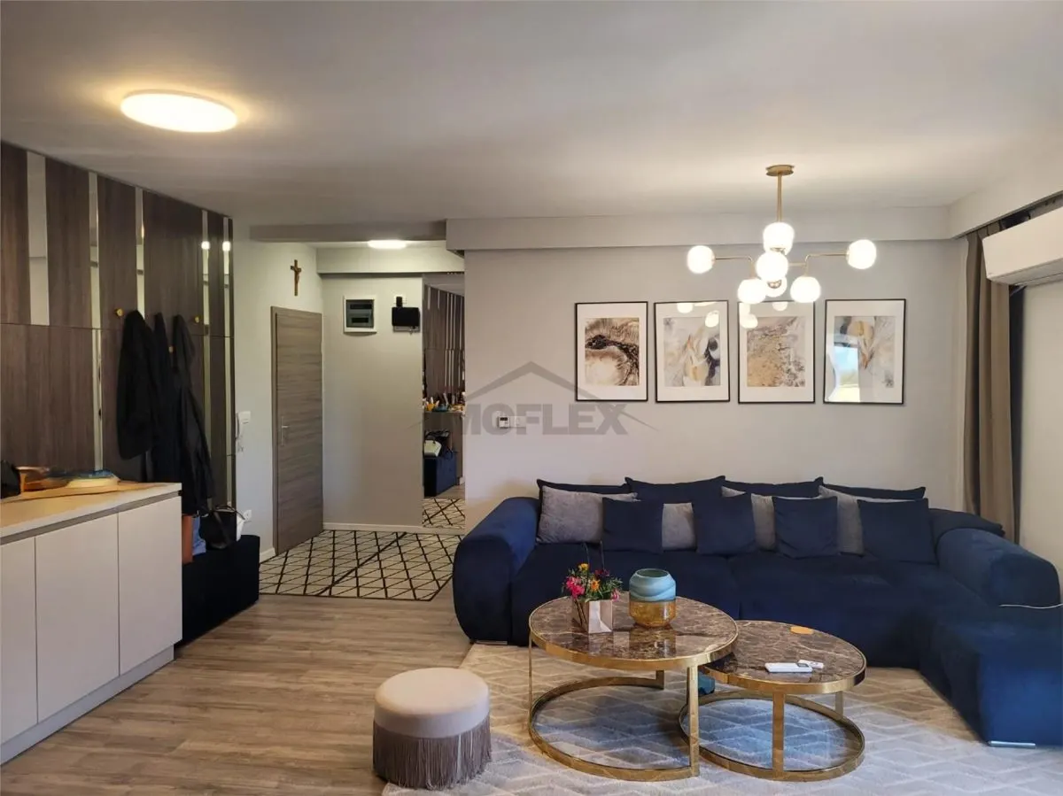 Apartament cu 4 camere utilat și mobilat premium de vânzare - foto 1