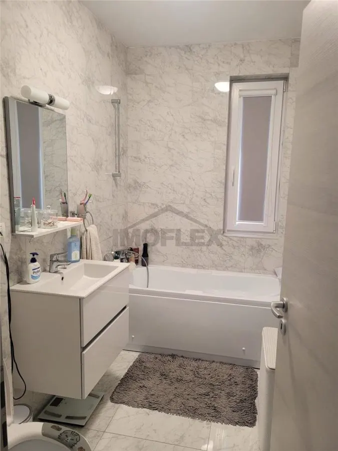 Apartament cu 4 camere utilat și mobilat premium de vânzare - foto 11