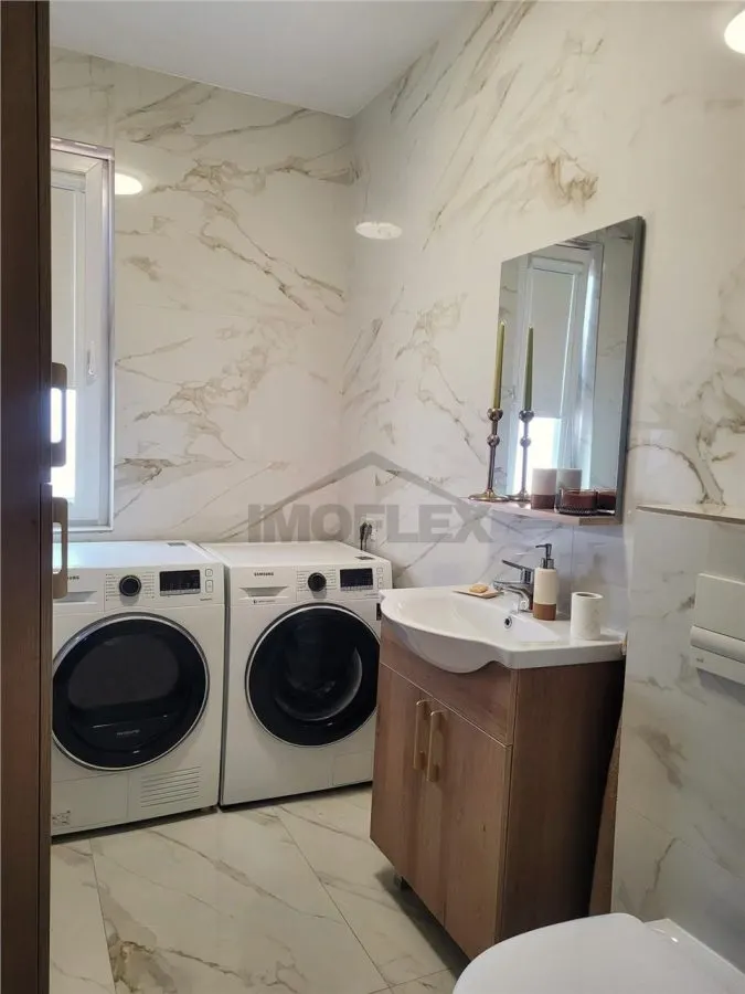 Apartament cu 4 camere utilat și mobilat premium de vânzare - foto 6