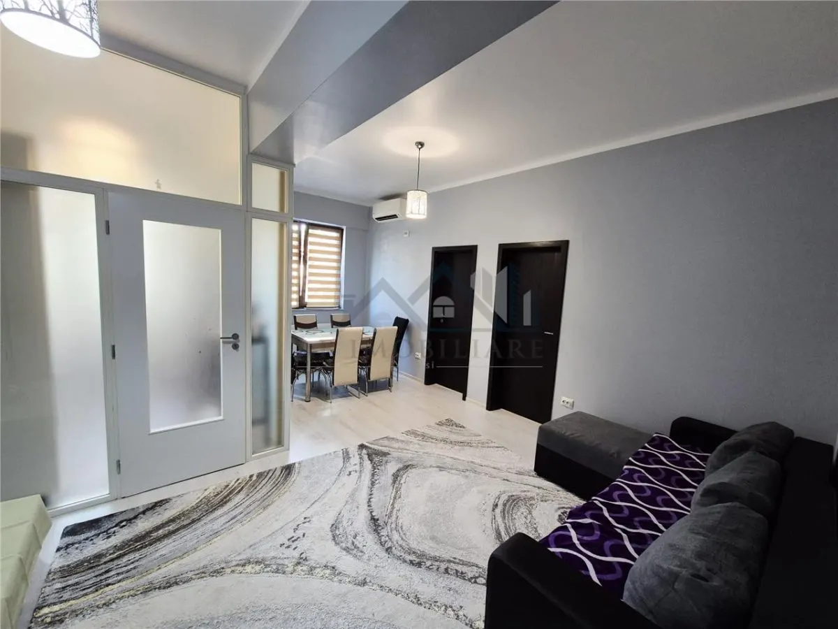 Apartament cu 3 camere de vanzare - foto 2
