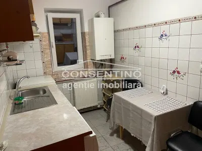 Se vinde imobil pe bdul N. Balcescu , mobilat si utilat - Buzau