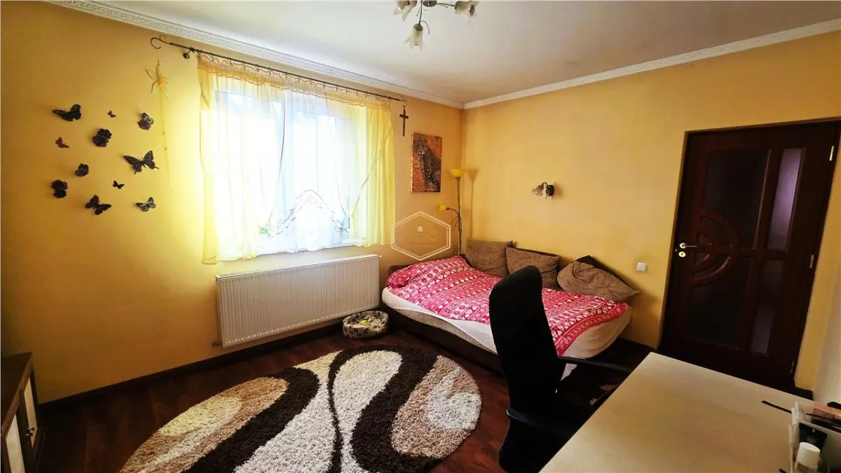 VIDEO | Aproape de oras: Casa cu 3 dormitoare, curte frumoasa si terasa cu gratar - foto 12