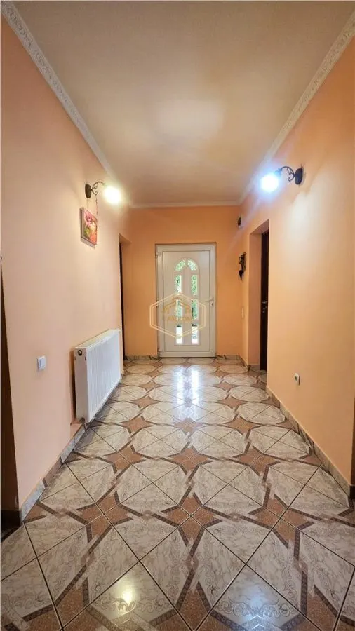 VIDEO | Aproape de oras: Casa cu 3 dormitoare, curte frumoasa si terasa cu gratar - foto 6