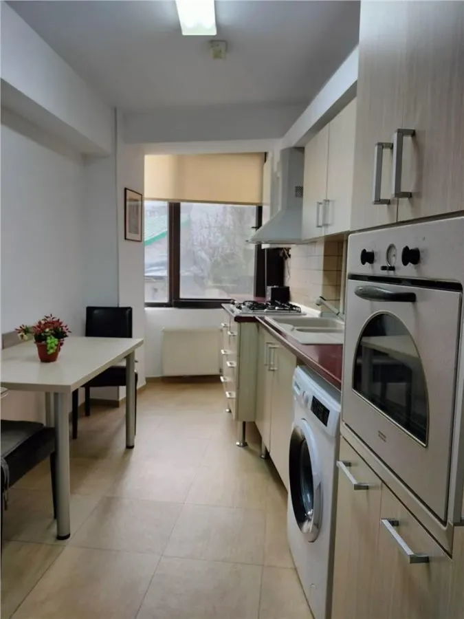 INCHIRIEZ APARTAMENT MODERN 2 CAMERE UNIRII  | NERVA TRAIAN - foto 3