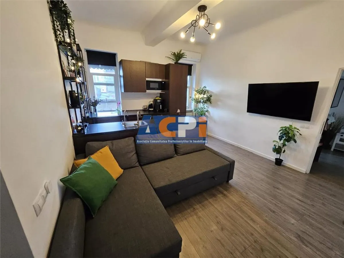Apartament de Închiriat în Piața Romană - Locație Centrală - foto 1