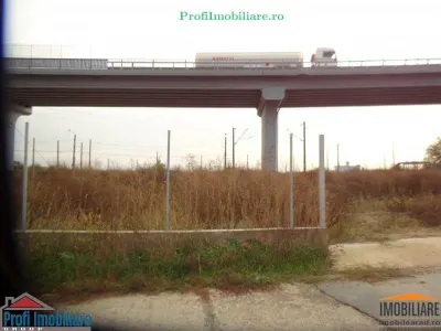 Teren 5.000 mp pt. diverse activitati cu acces din sosea strada Ovidiu in fata la CET Arad - foto 5