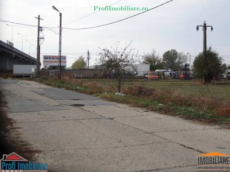 Teren 5.000 mp pt. diverse activitati cu acces din sosea strada Ovidiu in fata la CET Arad - foto 7