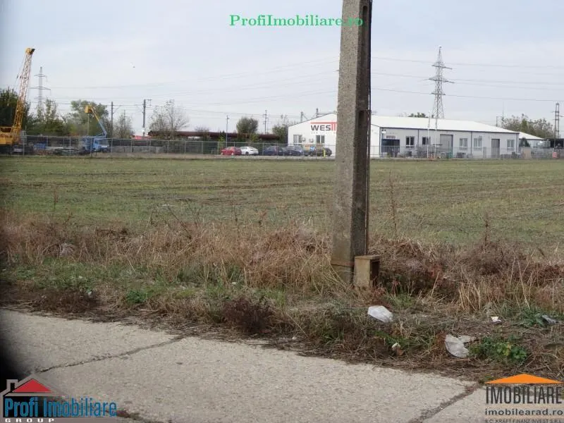 Teren 5.000 mp pt. diverse activitati cu acces din sosea strada Ovidiu in fata la CET Arad - foto 8
