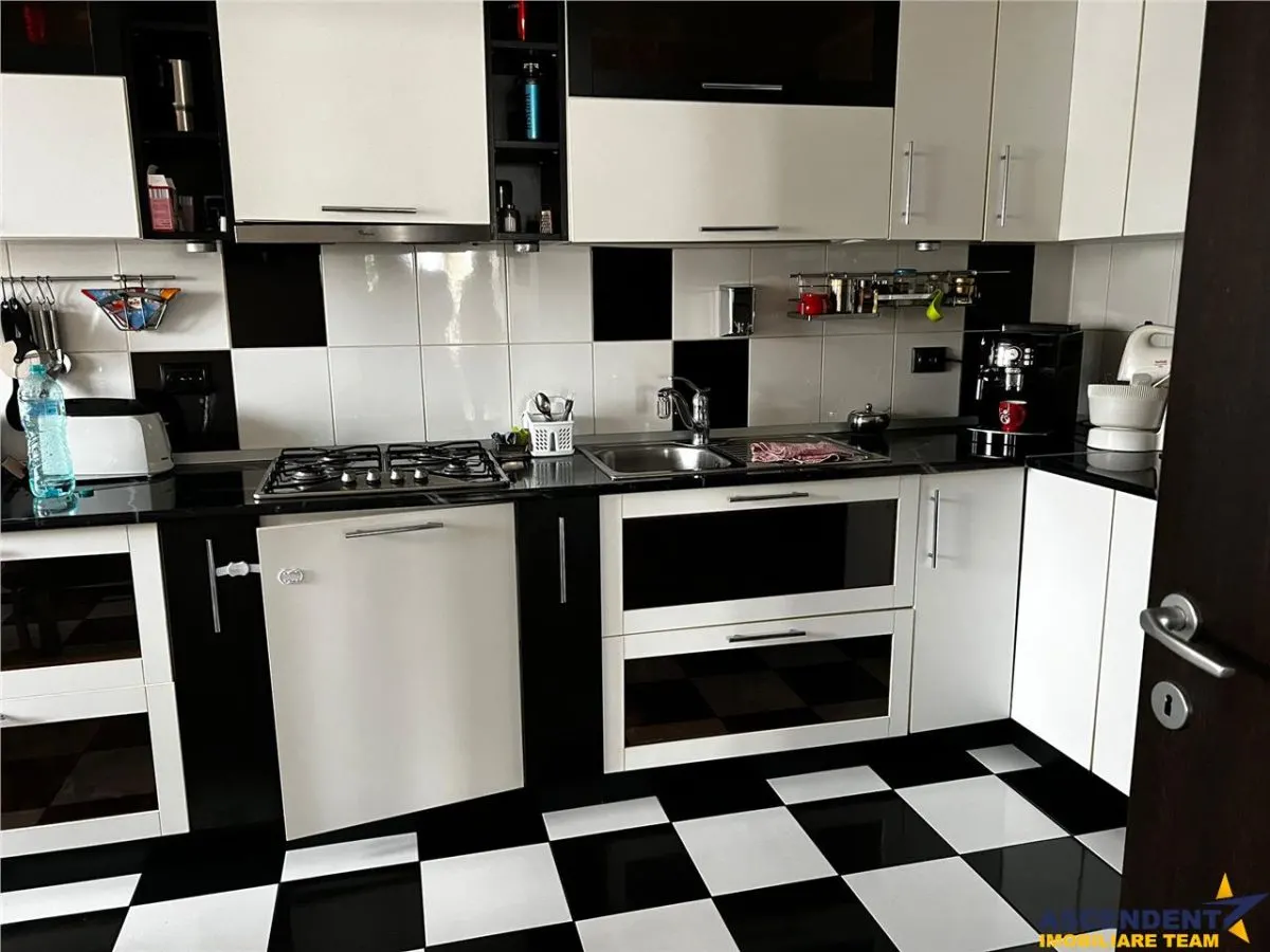 Casa ce imbina eleganta cu functionalitatea, confort pe infrastructura locala - foto 11