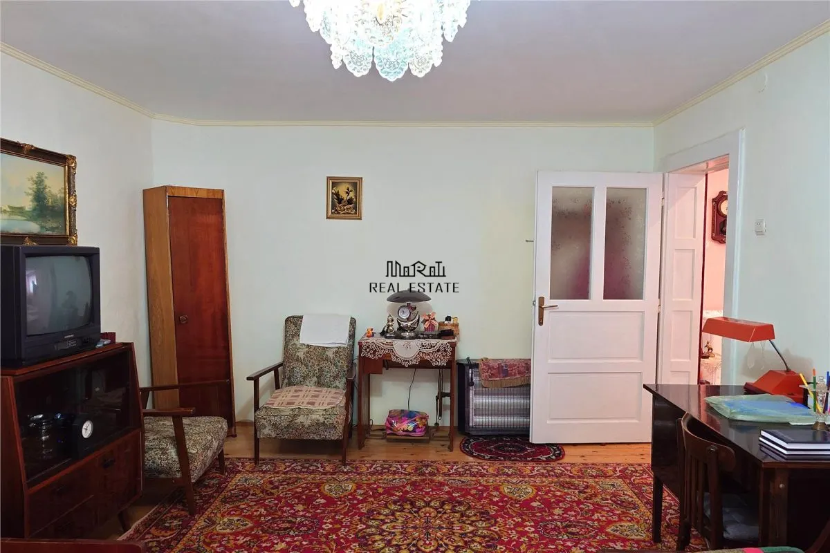 Gospodarie cu teren generos si constructii solide intr-o zona linistita - foto 7