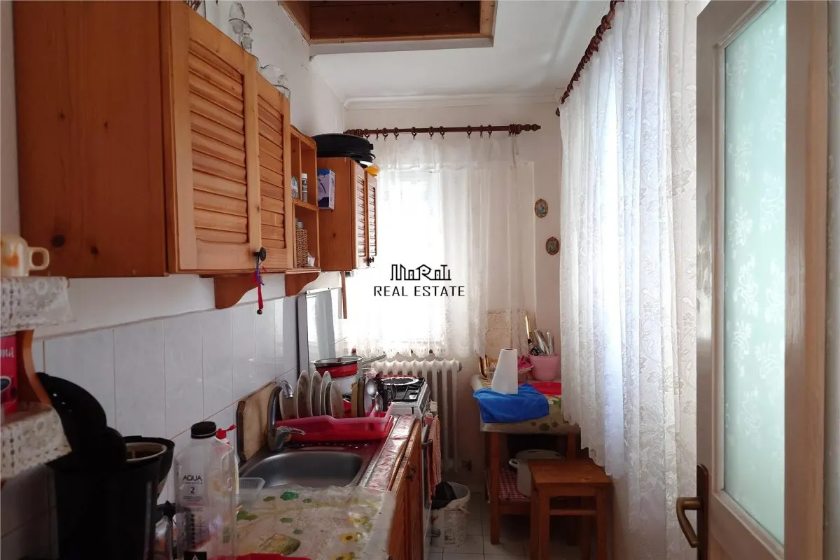 Gospodarie cu teren generos si constructii solide intr-o zona linistita - foto 10