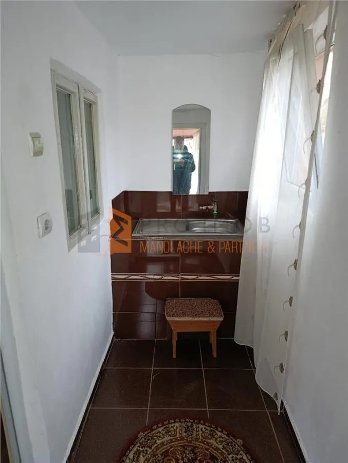 Casa tip parter zona Sarata Monteoru - foto 15