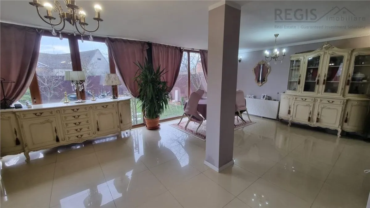 Casa de vanzare moderna cu costuri reduse, panouri solare si spatiu comercial inclus - foto 4