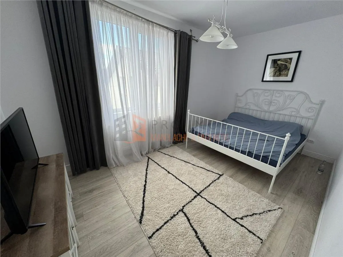 Casa tip S+P+1E+M in zona Gura Calnaului - foto 4