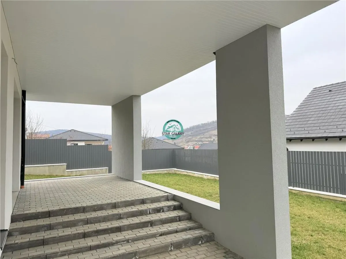 Vand casa cu 4 camere, 2 bai, suprafata utila 140 si teren 500 mp - foto 17