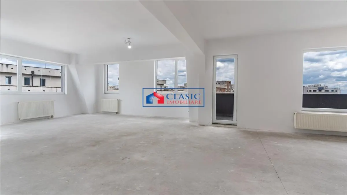 Vanzare apartament 4 camere tip penthouse bloc nou in zona Centrala cu parcare - foto 1