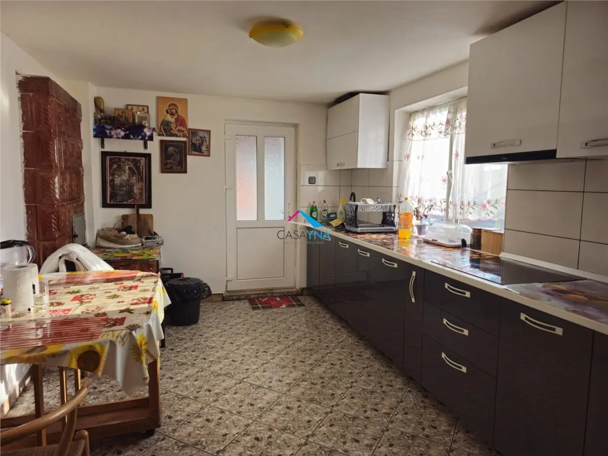 Casa cu 818 mp teren si garaj 87mp la strada! - foto 9