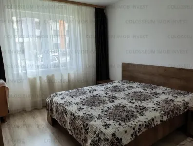 Apartament 3 camere, 2 bai, decomandat - zona Tractorul - foto 4