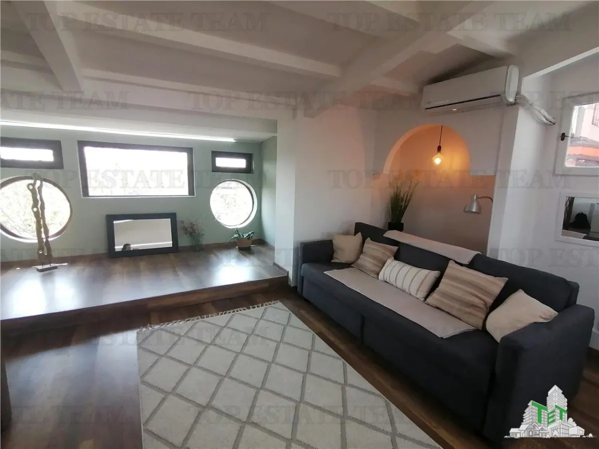 Apartament mansardabil de vanzare - foto 2