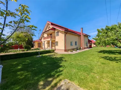 Casa P+E de vanzare in Lilieci â€“ 3.350mp teren intravilan, livada, 2 garaje, panouri solare - Lilieci