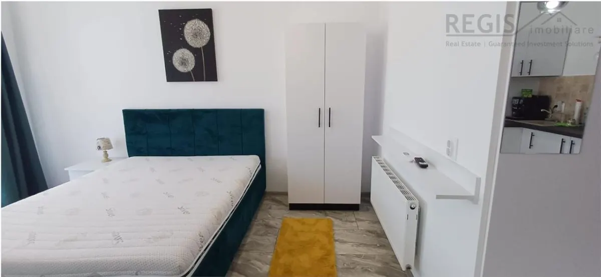 Garsoniera moderna si spatioasa - foto 5