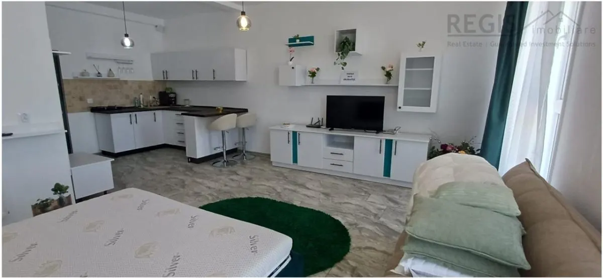 Garsoniera moderna si spatioasa - foto 7