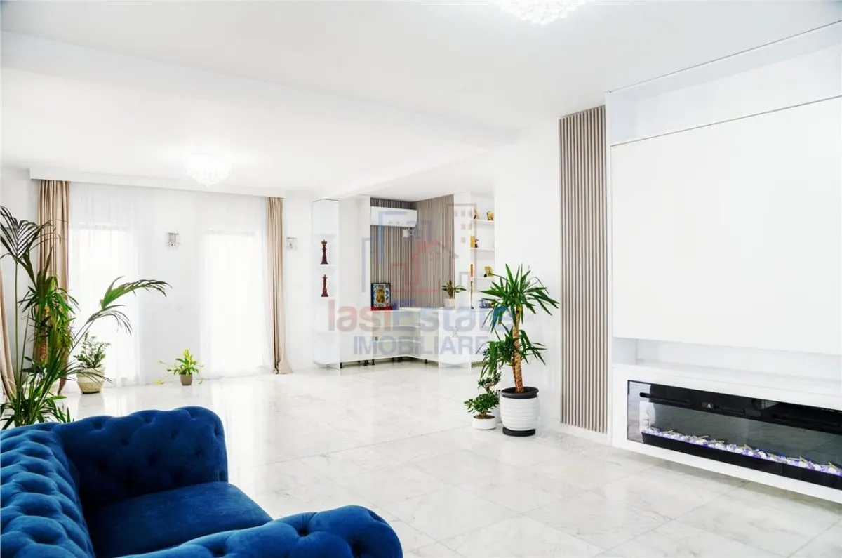 Casa intr-o zona linistita cu garaj si teren-1091 mp - foto 2