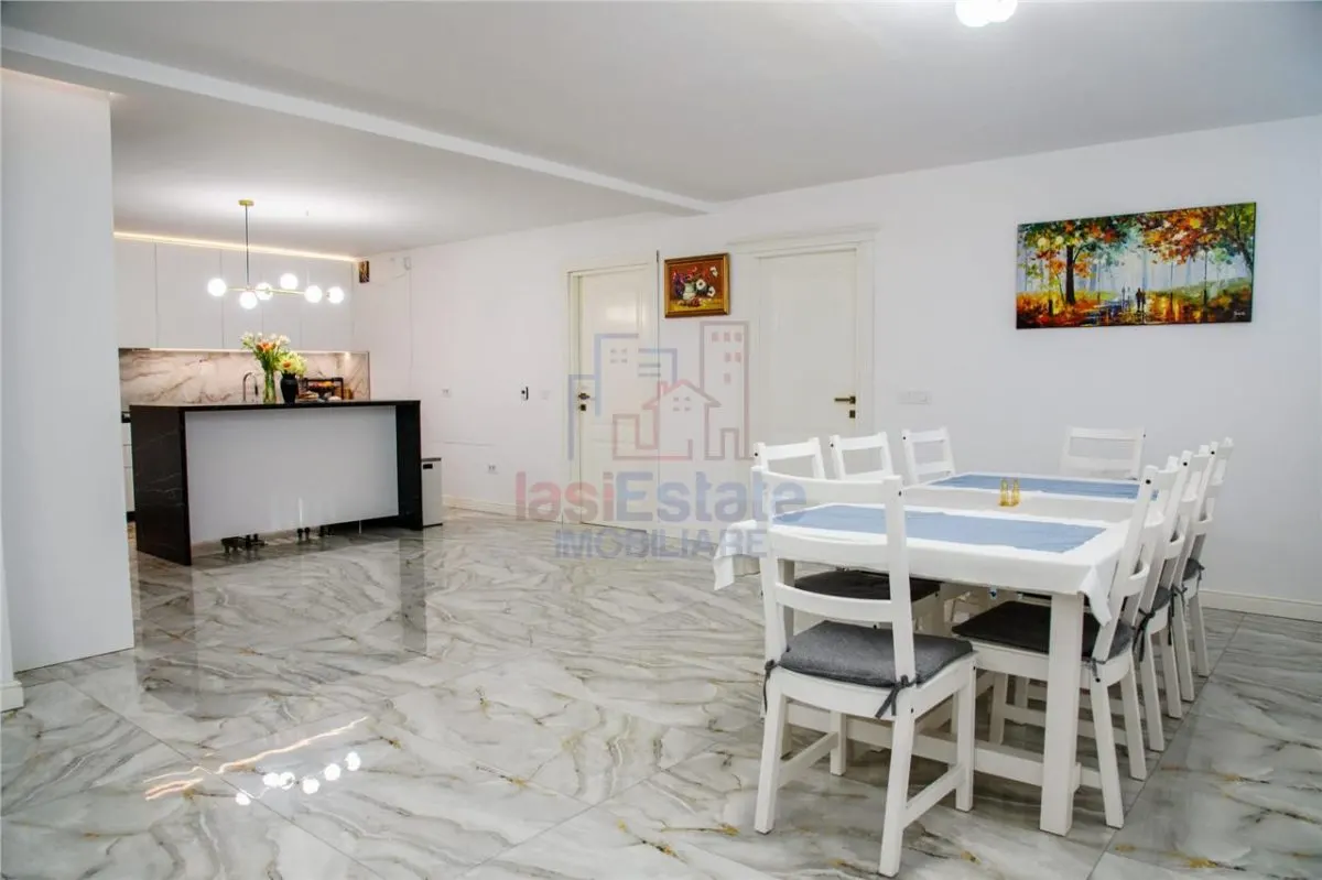 Casa intr-o zona linistita cu garaj si teren-1091 mp - foto 13