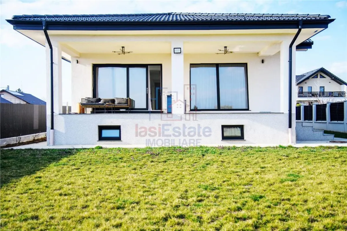 Casa intr-o zona linistita cu garaj si teren-1091 mp - foto 18