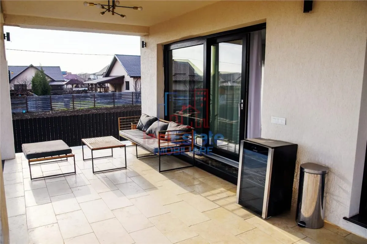 Casa intr-o zona linistita cu garaj si teren-1091 mp - foto 19