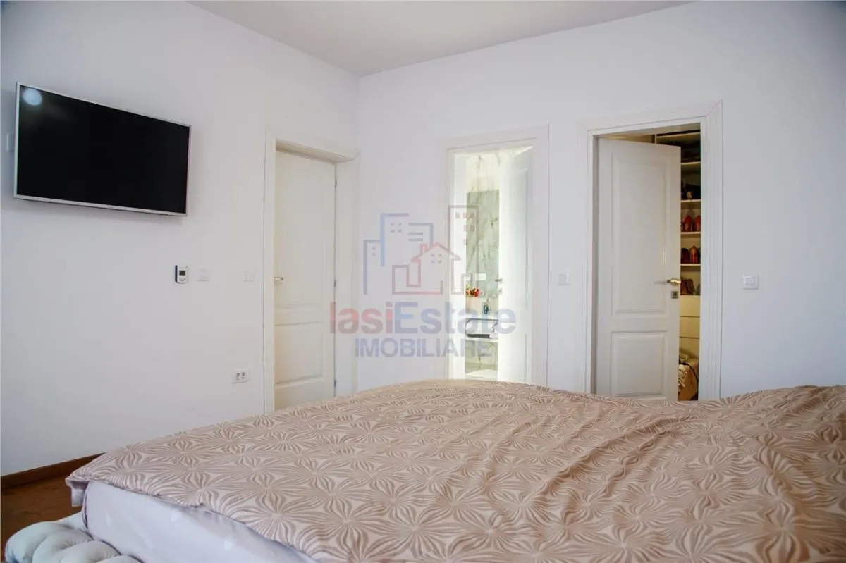 Casa intr-o zona linistita cu garaj si teren-1091 mp - foto 8