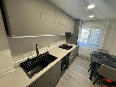 Ap 2 cam,parcare, mobilat si utilat de lux, et 2, Piata - Scoala 2 - foto 2