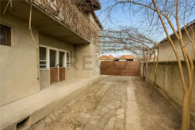 RECO Casa P+E cu 2 apartamente, garaj si curte proprie in Marghita - foto 15