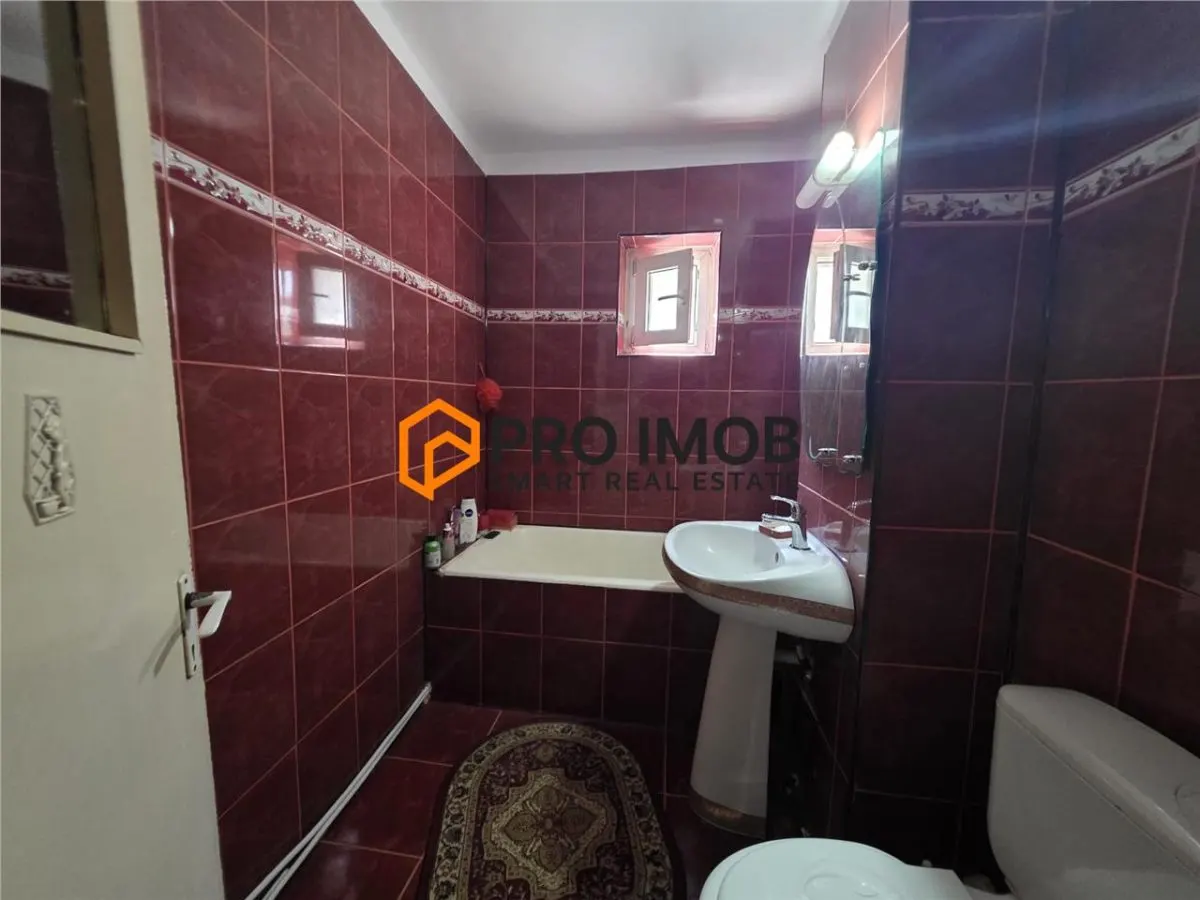 Apartament 4 camere cf 1 decomandat  Mun. Ramnicu Sarat - foto 10