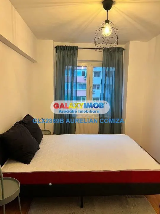 Apartament 3 camere decomandat Eroii Revolutiei mobilat modern - foto 11