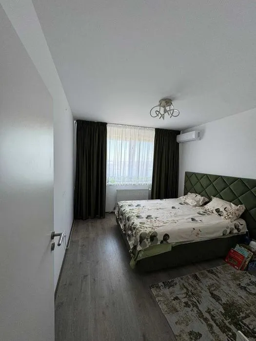 Are client suna marti 17.08.Apartament 2 camere Tractorul Grandis Residence,parcare,mobilat-utilat 142800 Euro - foto 3