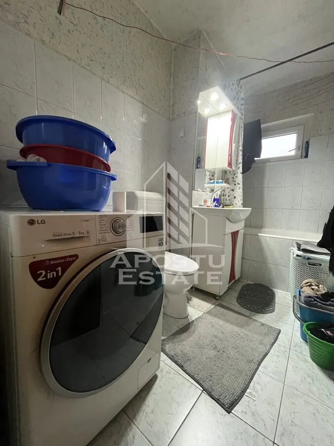 Apartament cu 3 camere,2 bai, etajul 1,centrala proprie,zona Girocului - foto 9