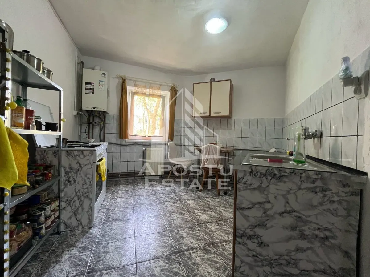 Apartament cu 2 camere, decomandat, parter inalt,centrala proprie - foto 4