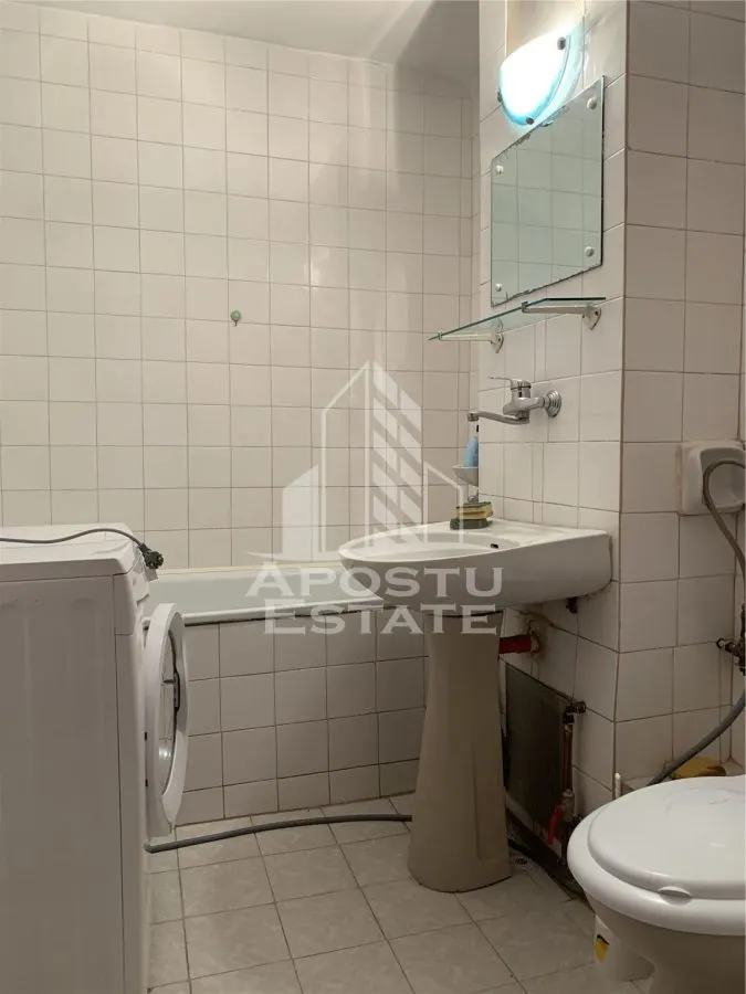 Apartament cu 2 camere, decomandat ,cu centrala proprie - foto 5