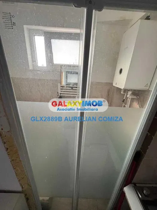 Garsoniera Piata Romana etaj 10/11/centrala/boiler/mobilata/utilata - foto 7
