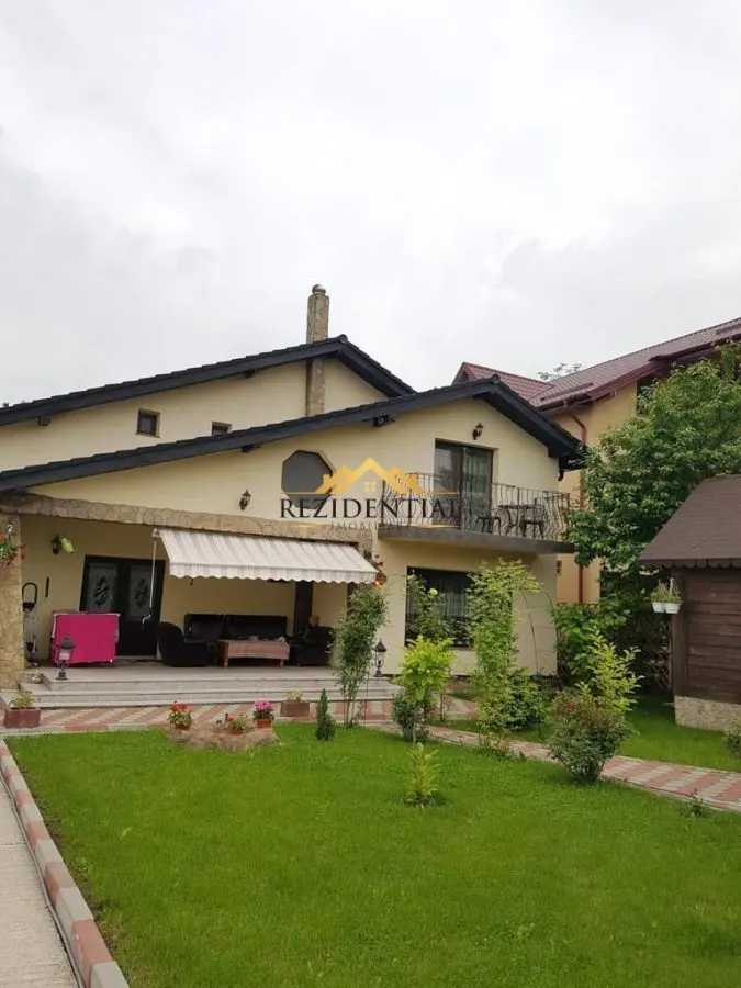 CASA CU ETAJ IN ORAS - foto 1