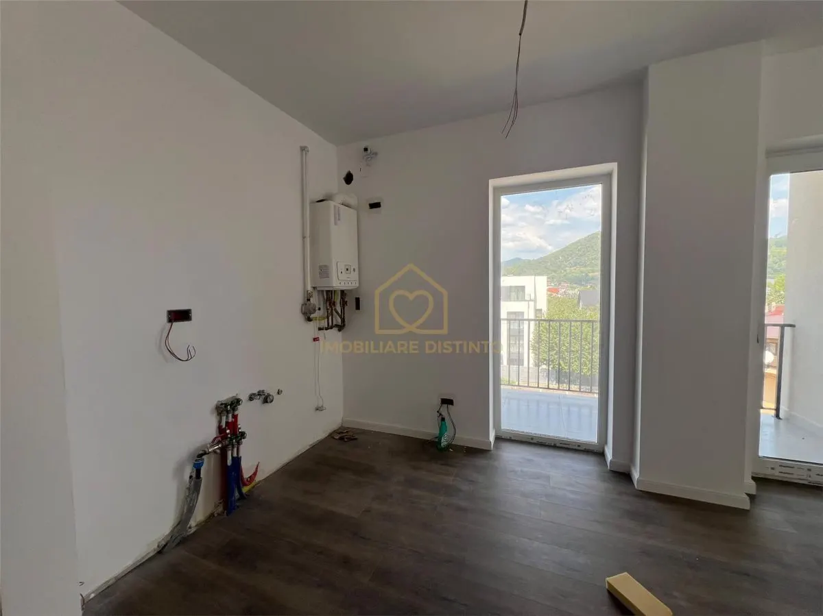 Garsoniera finisata si partial mobilata zona Horia - foto 7
