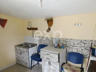 Casă tradițională cu 2029 MP, livadă, puț propriu - foto 7