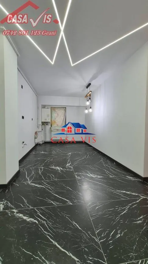 Apartament inOnesti 0742 801 123, zona Mal - foto 2