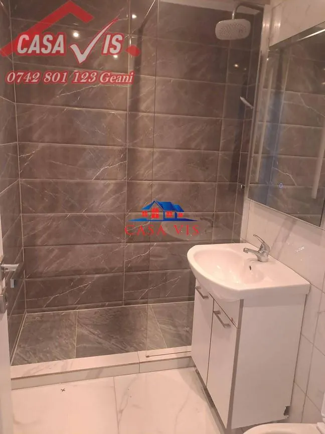 Apartament  2  camere in Onesti renovat parter - foto 1