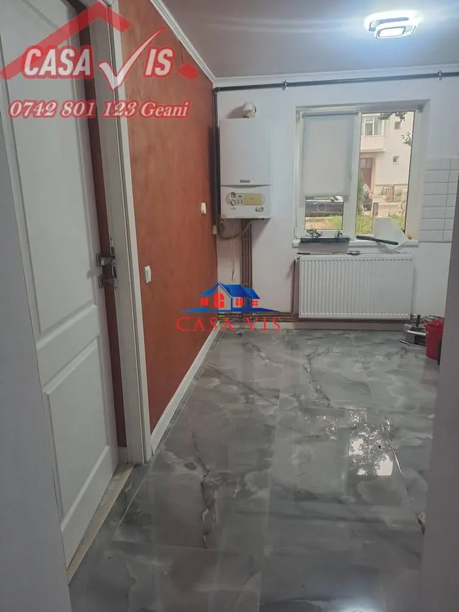 Apartament  2  camere in Onesti renovat parter - foto 11