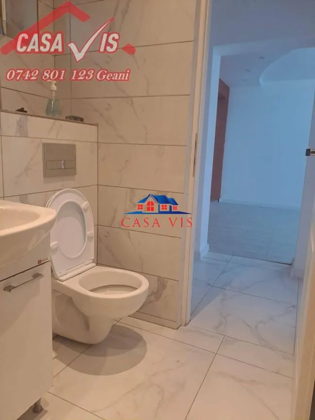 Apartament  2  camere in Onesti renovat parter - foto 5